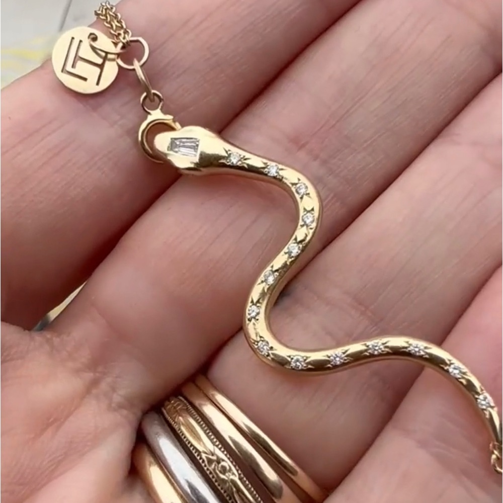 SOLD. Kundalini extender/petite bracelet/pendant.  14k. 3gms.
